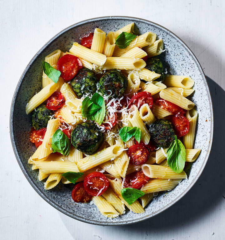 Pasta with roasted spinach polpette and tomatoes