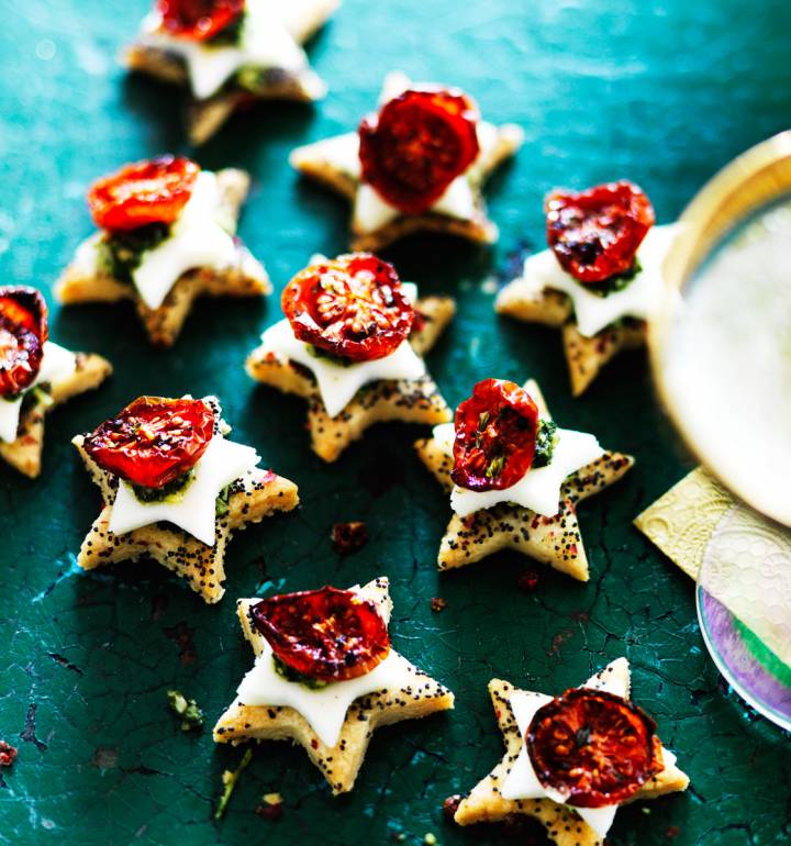 Parmesan shortbreads with mozzarella, cherry tomatoes and pesto