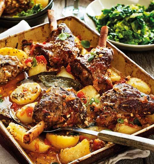 Greek lamb kleftiko with potatoes, oregano and lemon