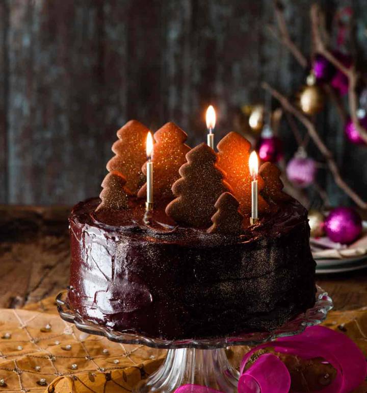 Double fudgey chocolate cake with a gingerbread forest
