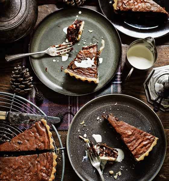 Boozy raisin, chocolate and walnut tart