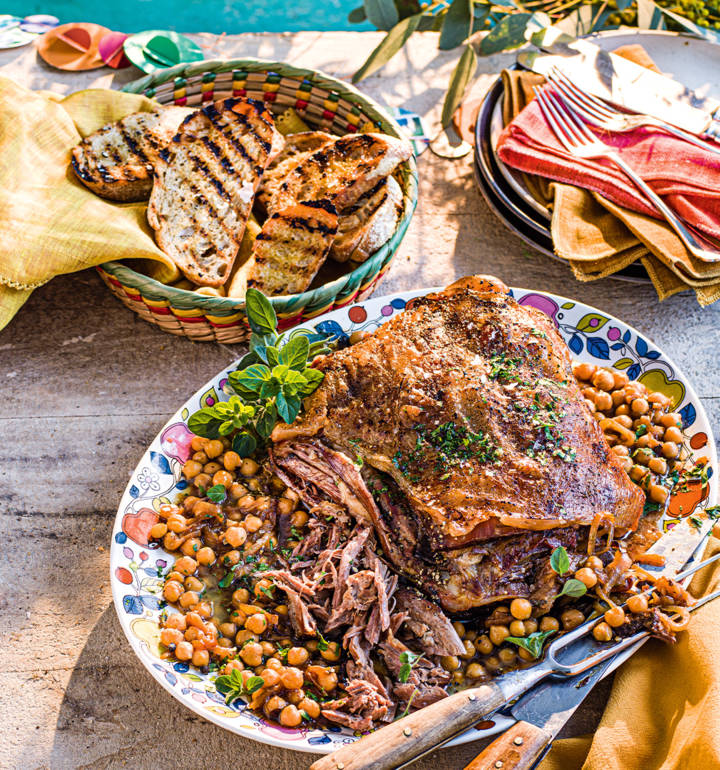 Braised shoulder of lamb with chickpeas, onions, garlic and oregano