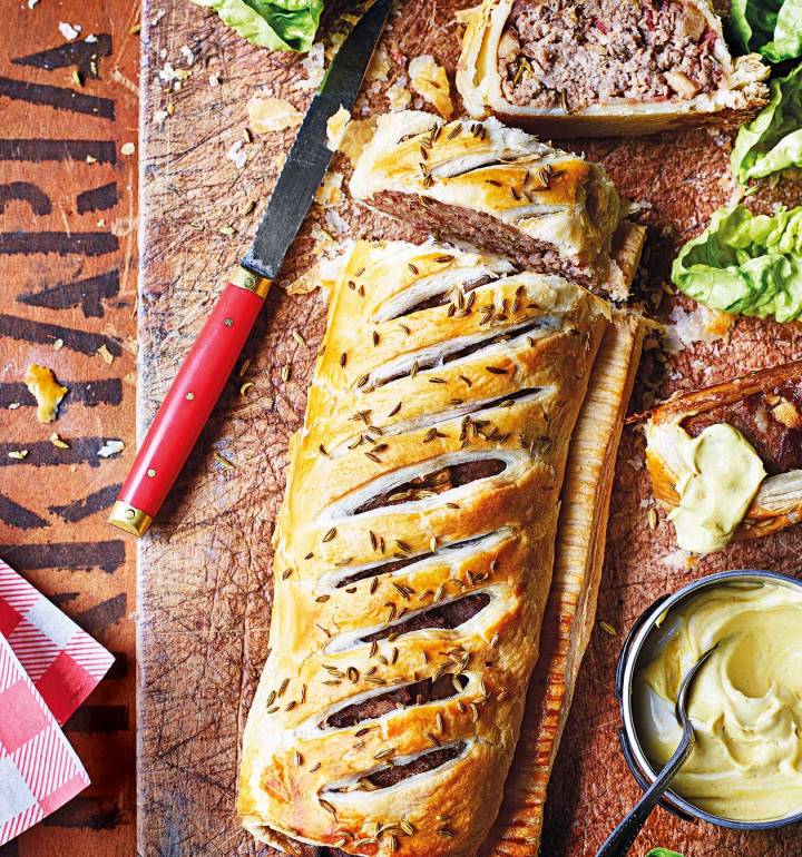 Pork and stout sausage roll with mustard dip