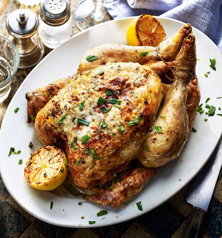 Roast chicken stuffed with lemony goats’ cheese and tarragon