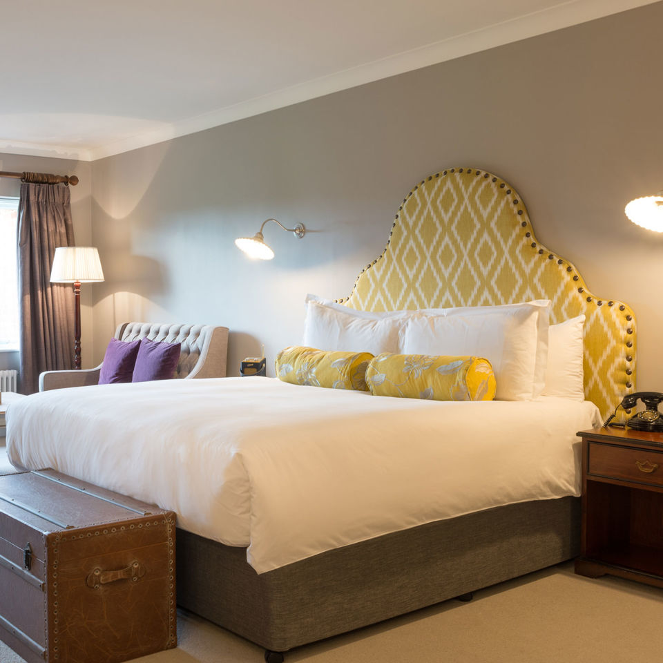 Retro touches add a sense of history to the bedroom