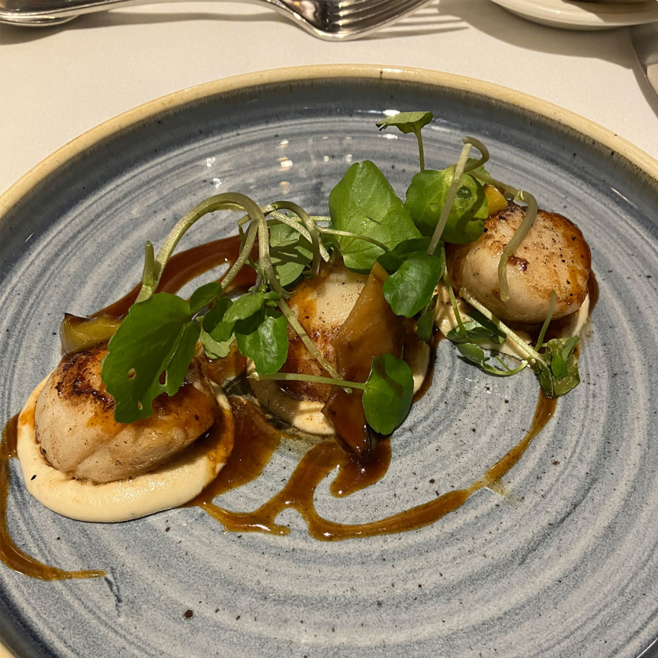 The scallop starter served with hog's pudding purée