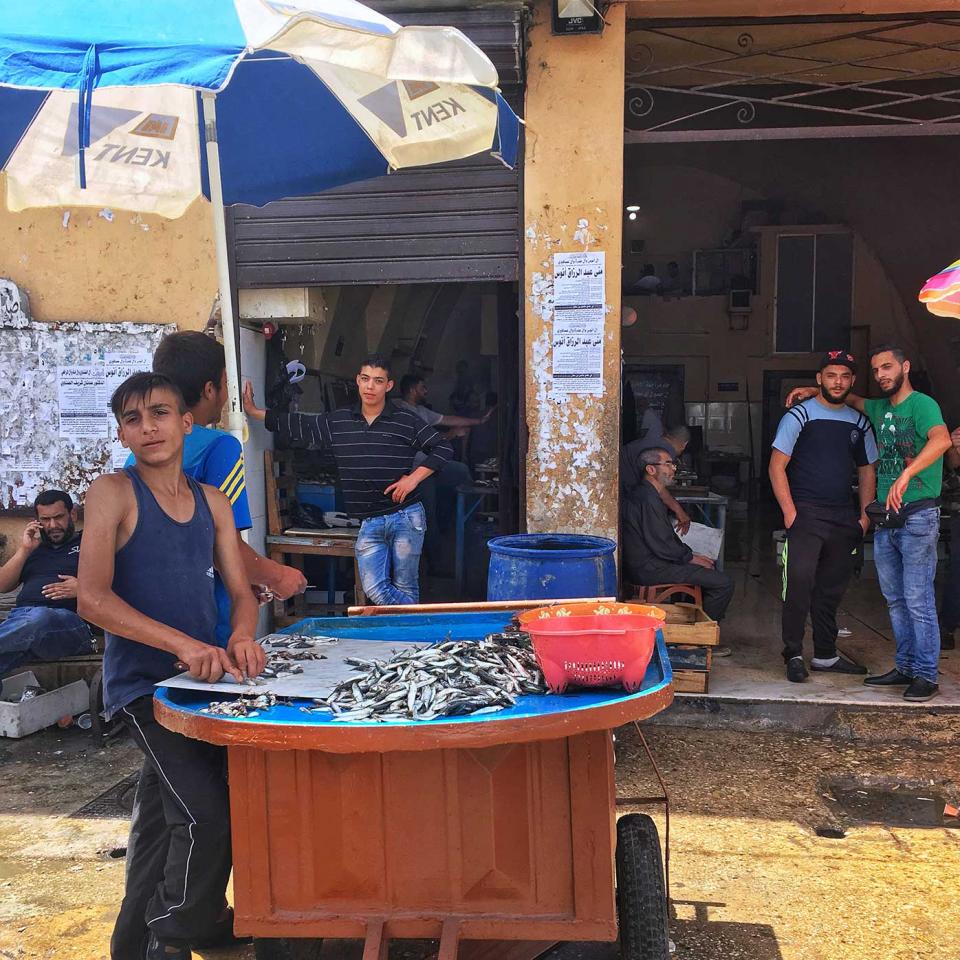 Selling fish on the streets of Tripoli. Image: Felicity Spector