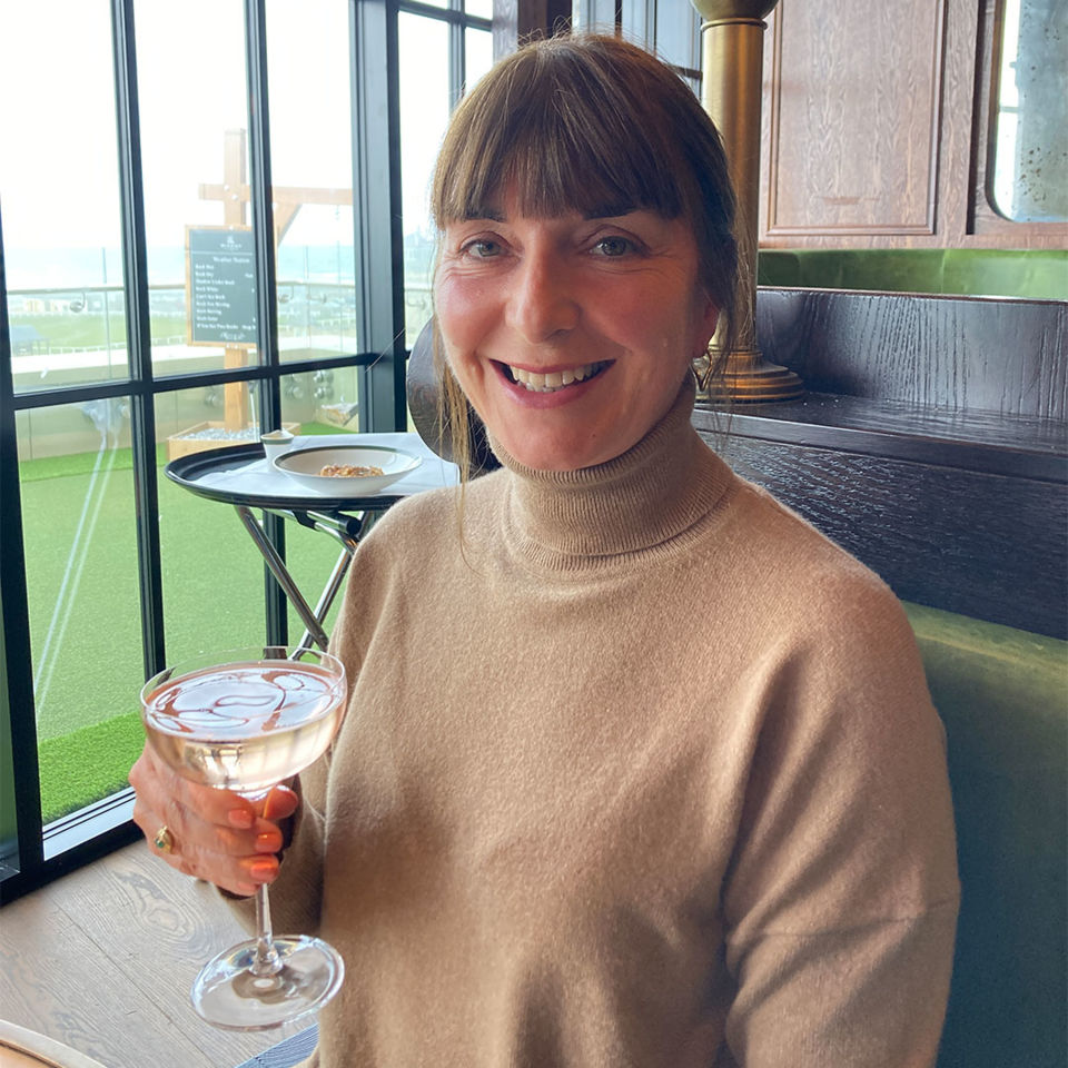 Helena enjoying a cocktail