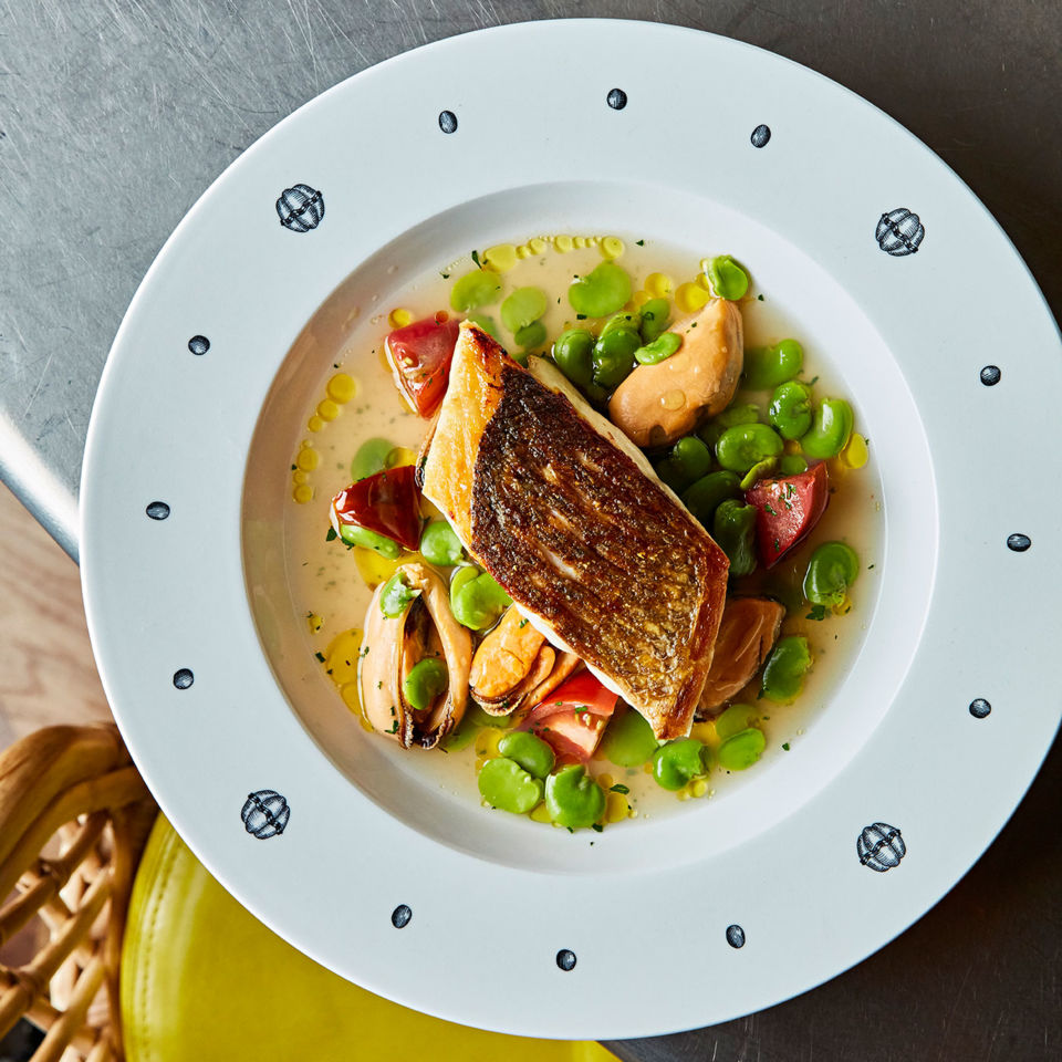 Seabass, Iberico, tomatoes, mussel and broad bean broth