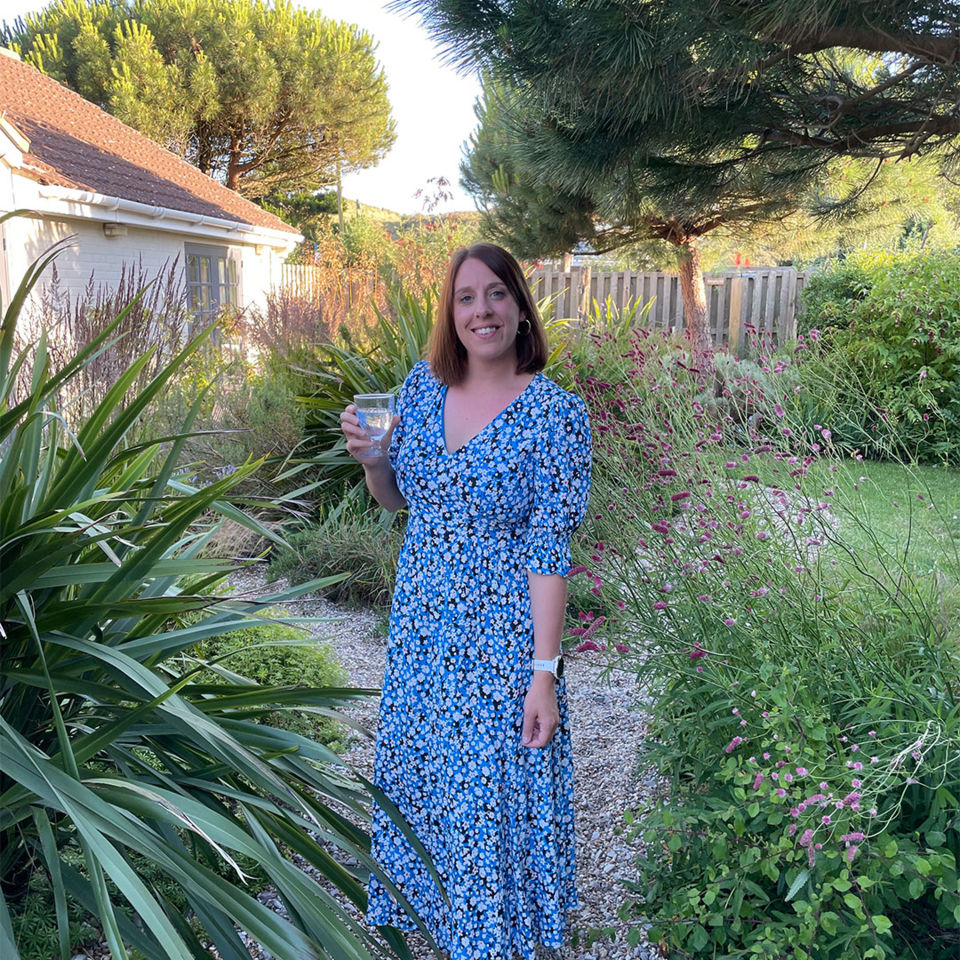 Liz enjoying a drink