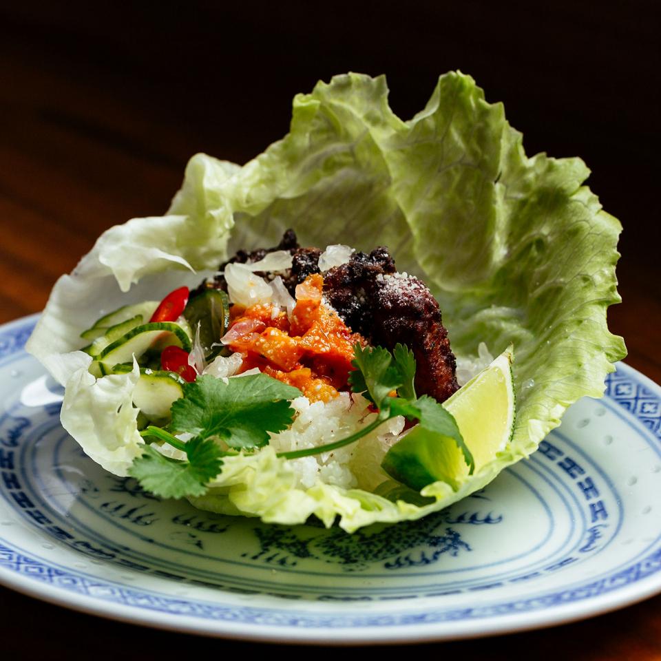Hoisin grilled pork belly, mussels and chilli jam wrap