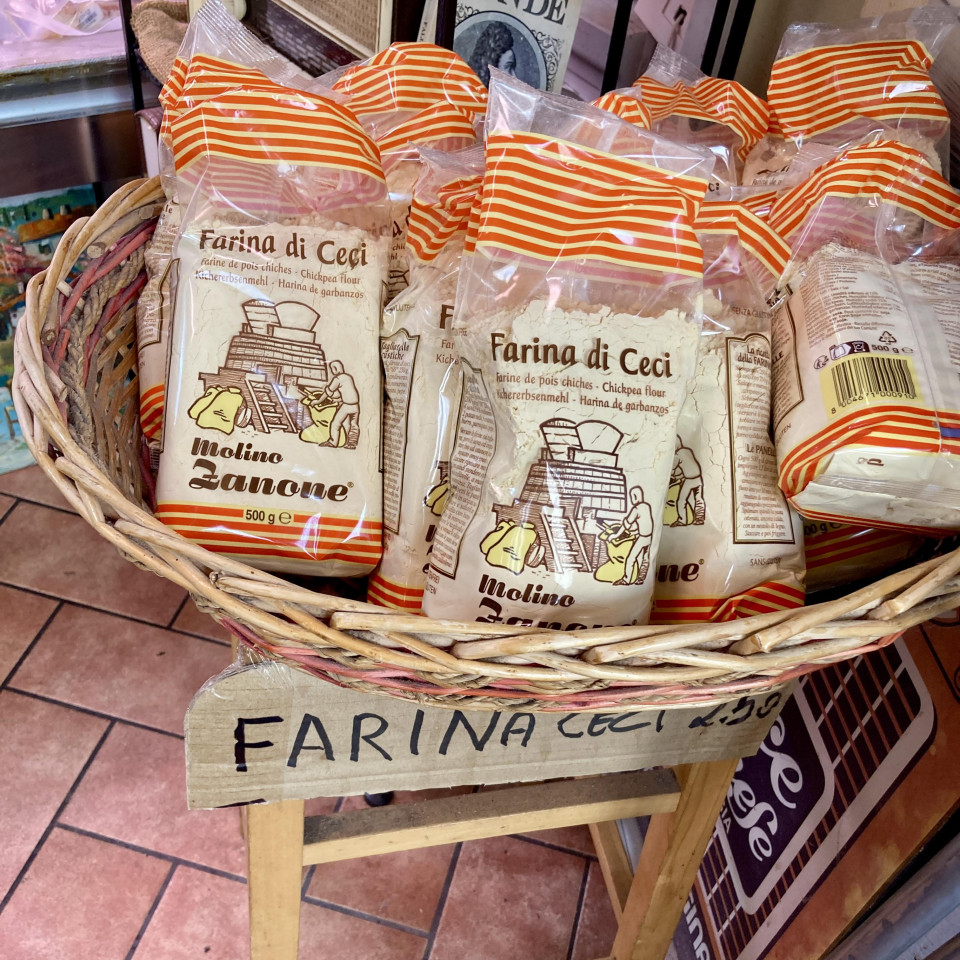 Bags of chickpea flour for sale in the Mercato Centrale in Livorno