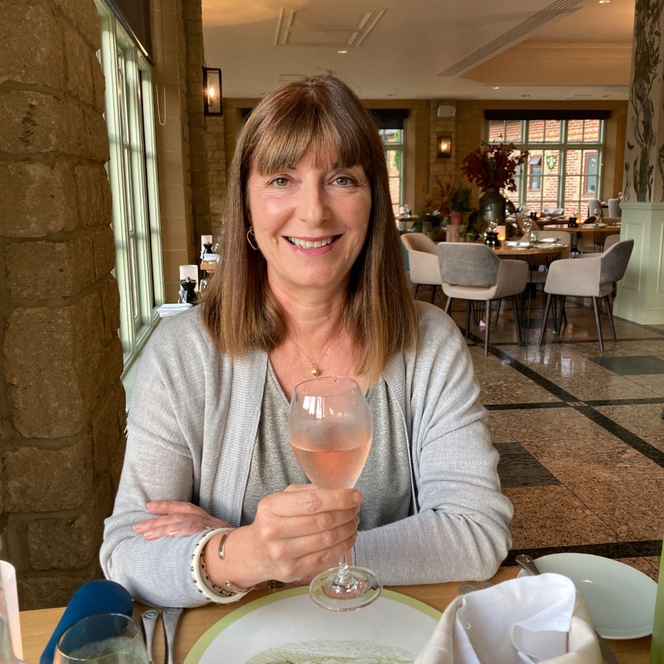 Helena enjoying a cold glass of rosé