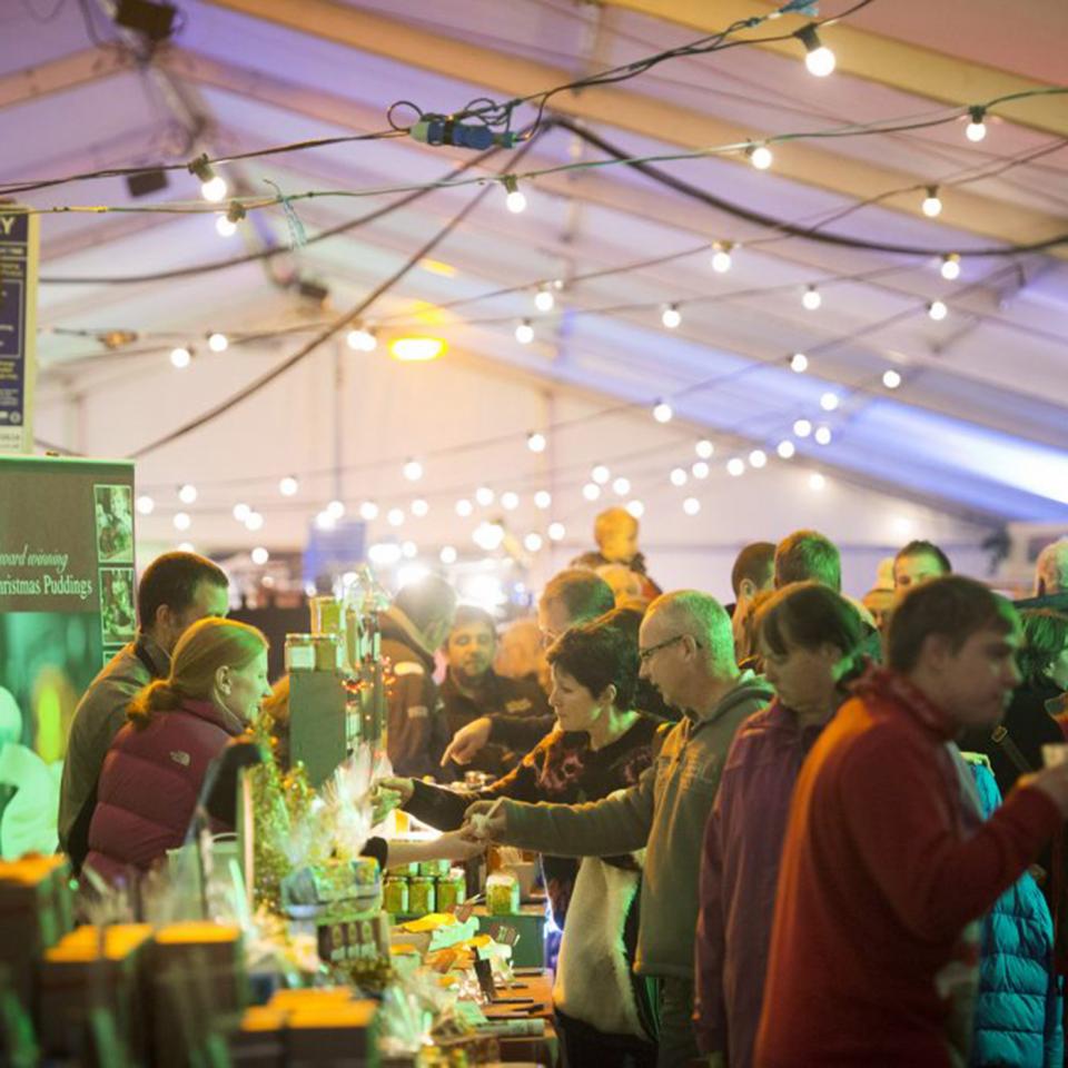 Sampling local produce at the Padstow Christmas Festival