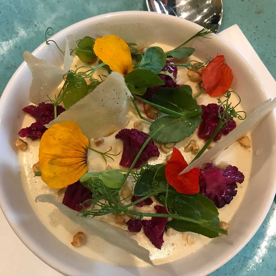 Panna cotta topped with edible flowers