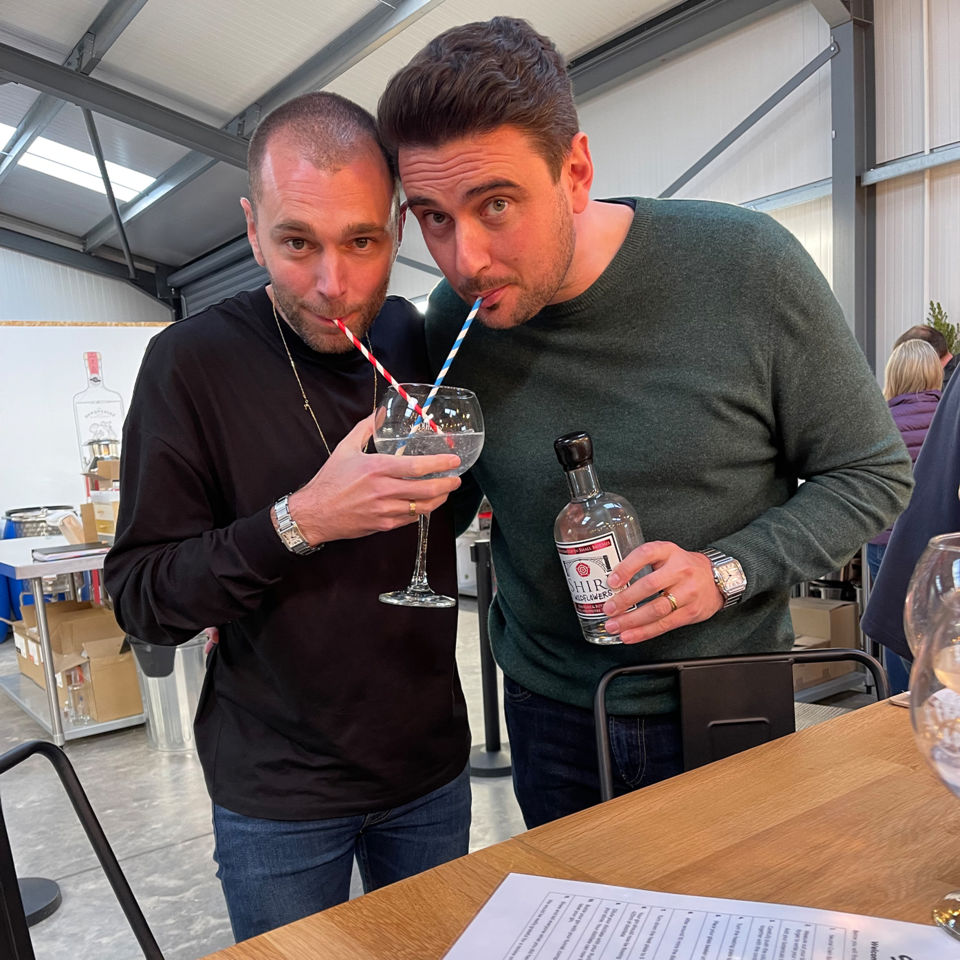 Nicky and John taste-testing their handmade gin