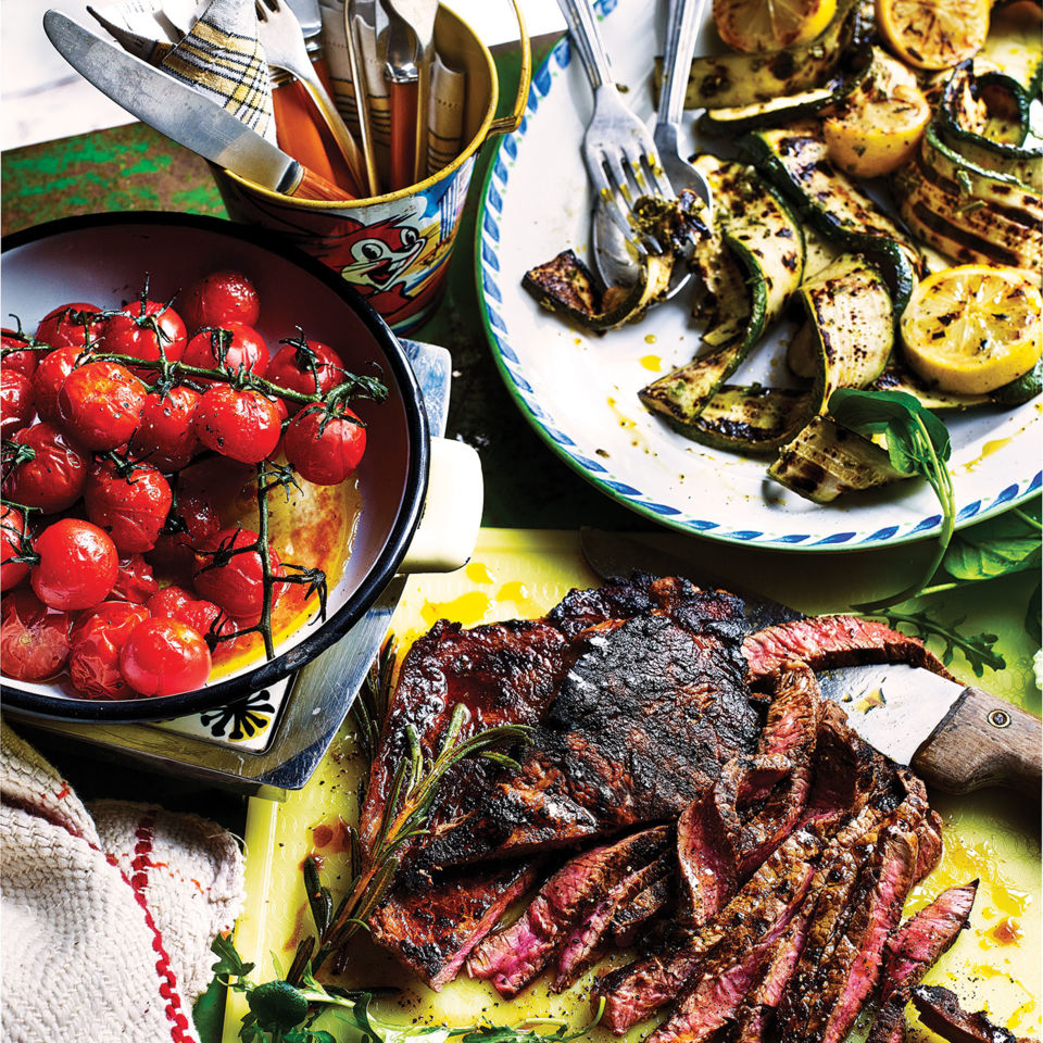 Image: Kris Kirkham. Coffee and rum-marinated steaks with griddled courgettes and roasted vine tomatoes