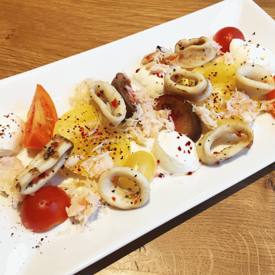 Heirloom tomatoes, crab, calamari and burrata