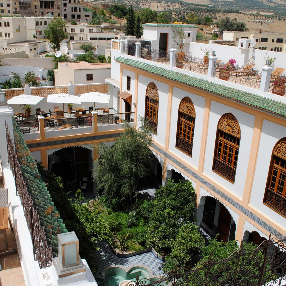 Listen to the call to prayer from the rooftop terrace of the Palais Amani