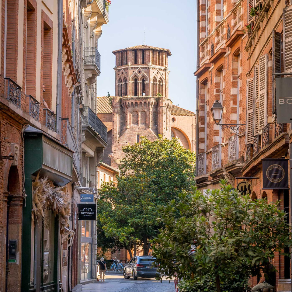 Buildings on Rue des Arts showing why Toulouse is called ‘The Pink City’