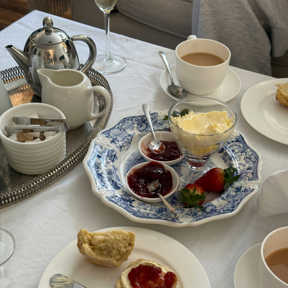 Tea, fresh scones and clotted cream on arrival