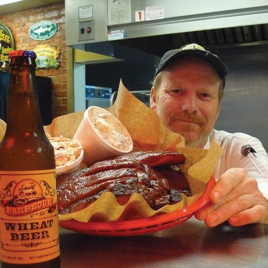 Bryan running the kitchen at Bryan's Black Mountain Barbeque