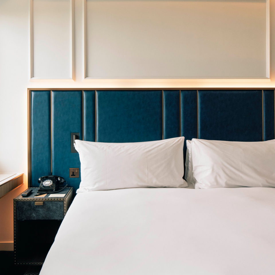 The super-smart navy and white bedroom