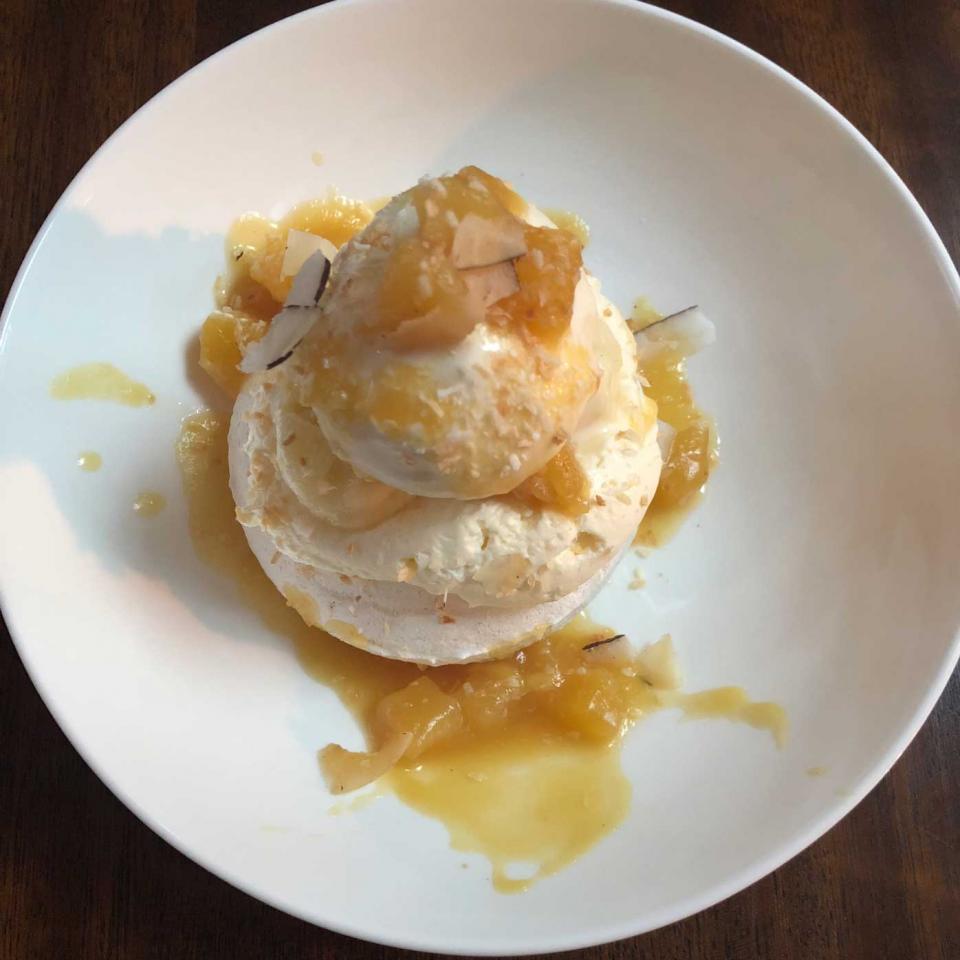 Pineapple and coconut pavlova, with rum caramel
