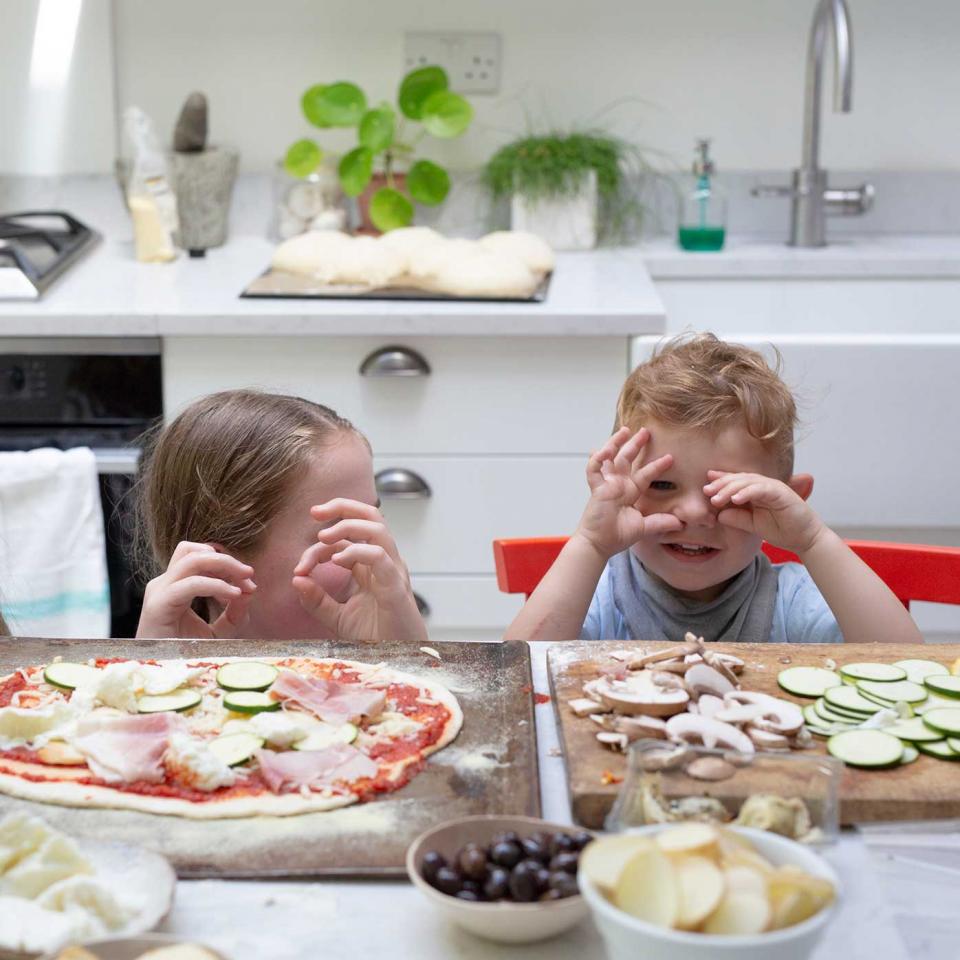 Tom's son Acey and a friend make pizza. Image: Christian Barnett